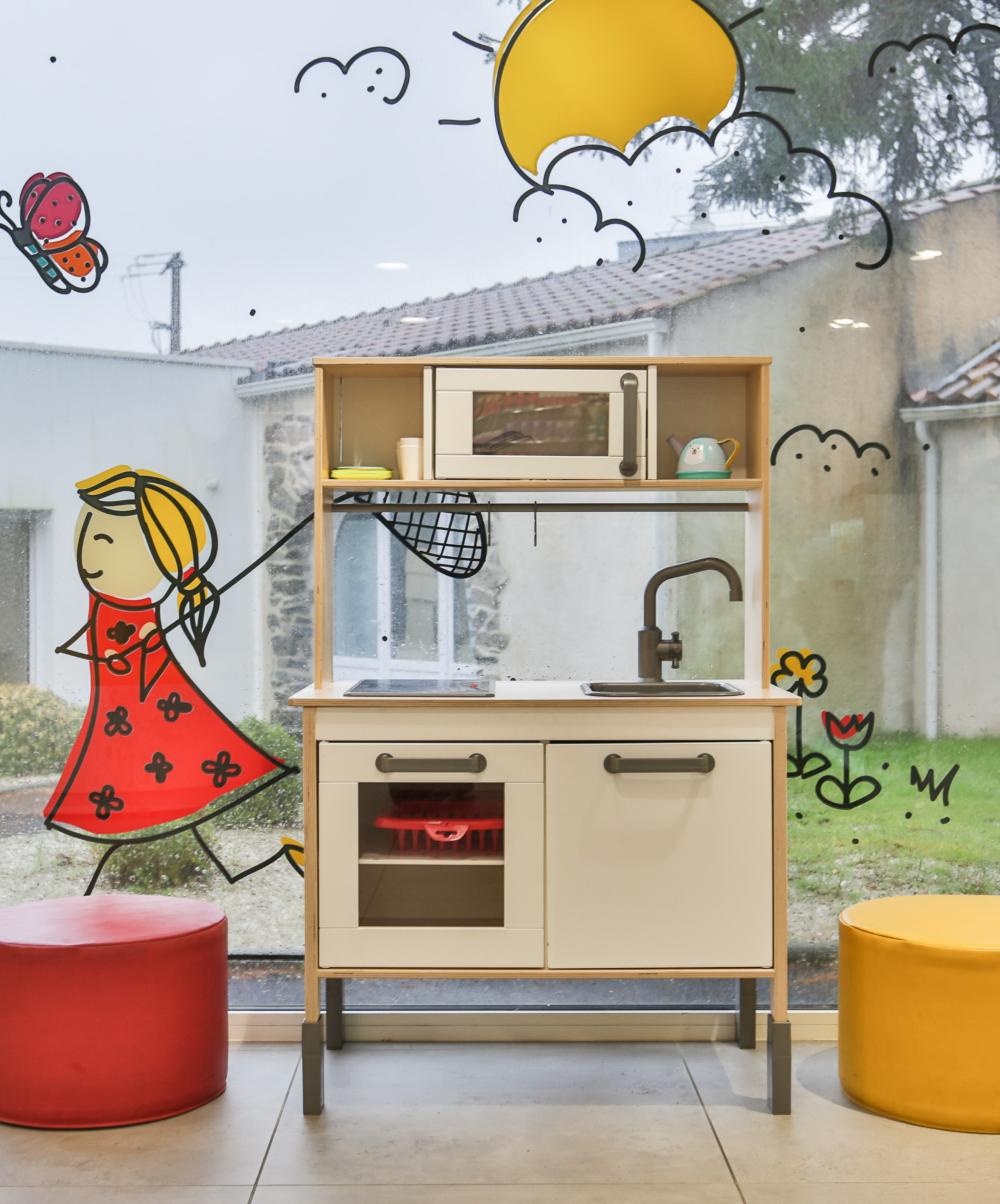 Espace enfant dans l&#039;agencement de la pharmacie Bechiau pour offrir un espace d&#039;attente au sein de l&#039;officine.