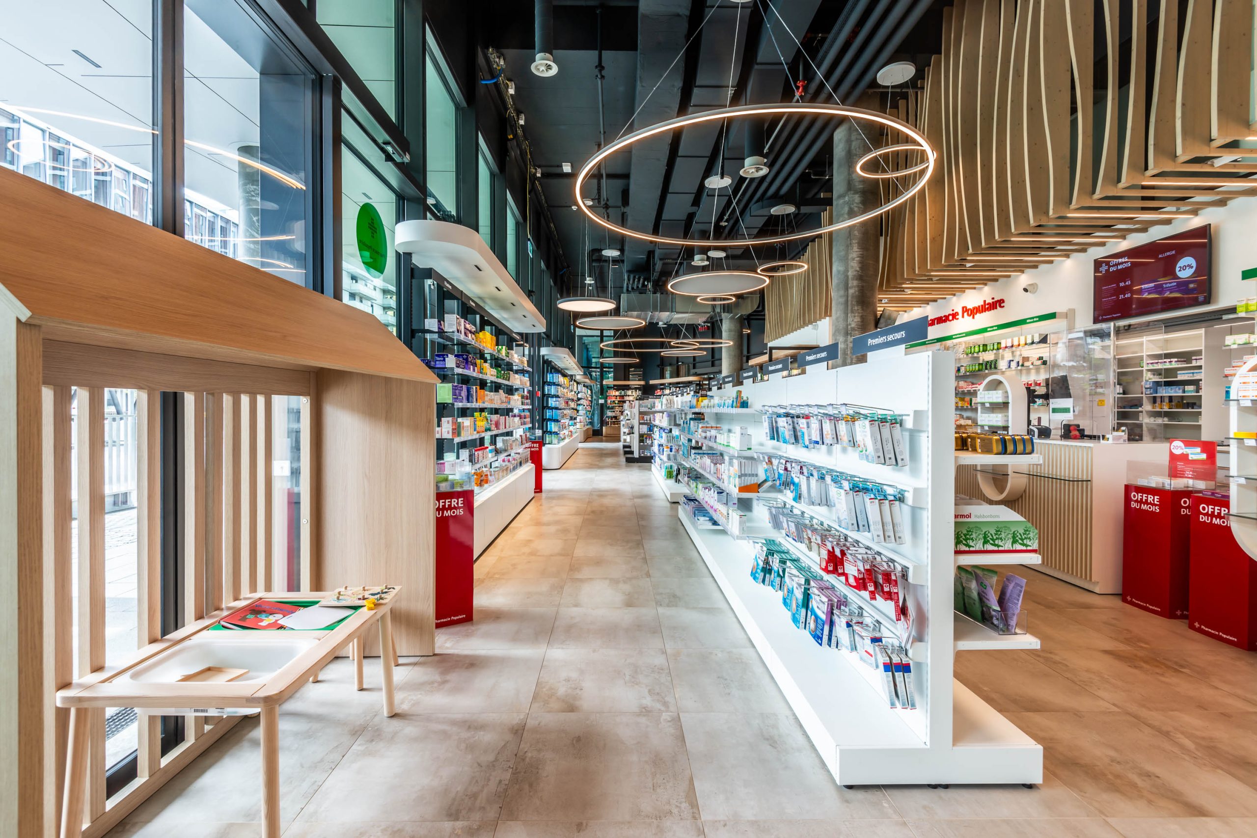 Micro architecture . Pharmacie Populaire Etang. Gestion flux. Espace enfants
