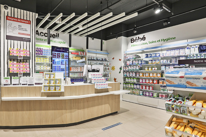 Accueil de la pharmacie avec un mobilier comptoir sur-mesure au sein de la pharmacie.