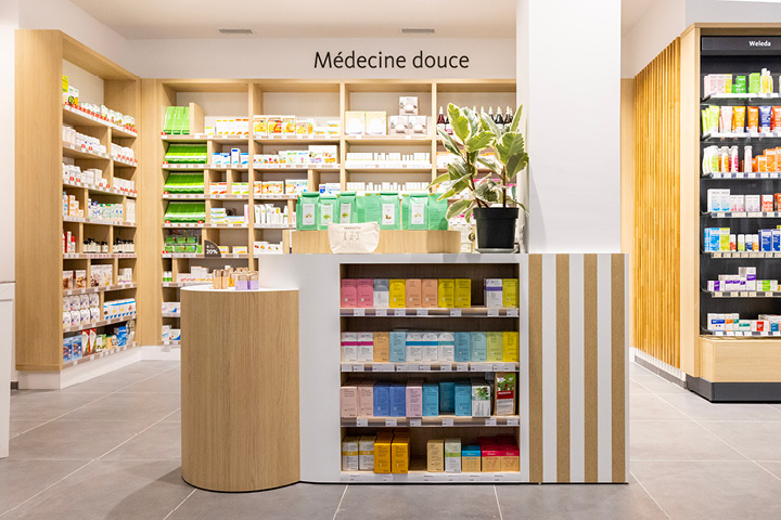 Mobilier sur-mesure dédié aux produits de médecine douce, optimisant l’exposition et le confort client.