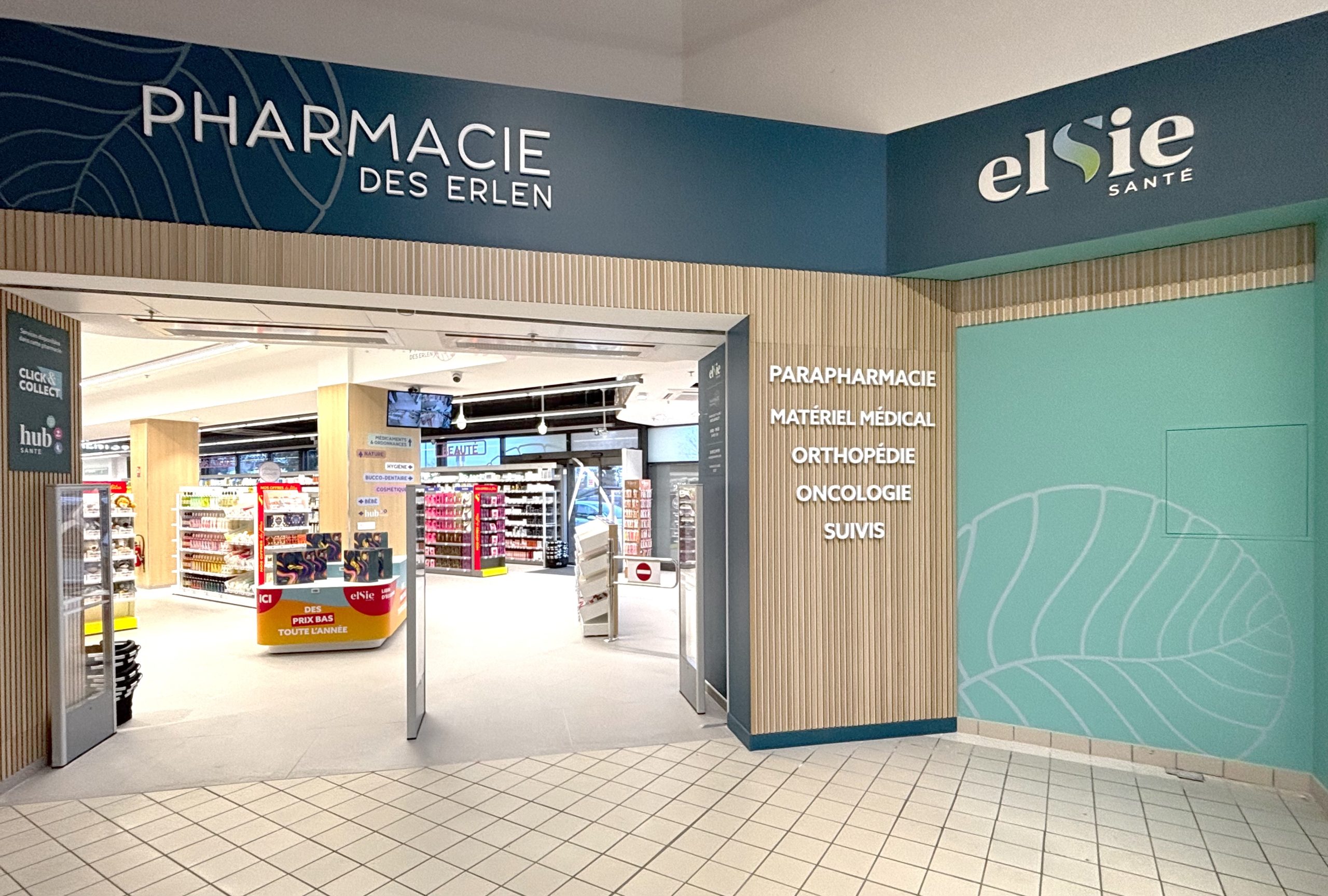 Vue de l'entrée de la pharmacie des Erlen avec une signalétique claire.