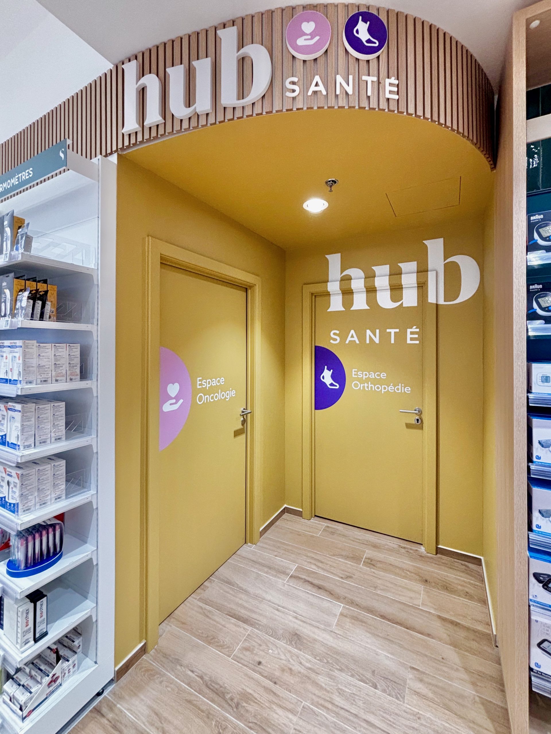 Mise en avant du hub santé dans la pharmacie des Erlen. Logo et design graphique claire.